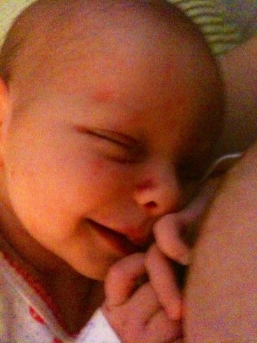 If only all attempted feedings ended like this. Anyone who tells you infant smiles are just gas is wrong: gas means grimaces, and you can usually tell. Smiles mean satisfaction and relaxation.