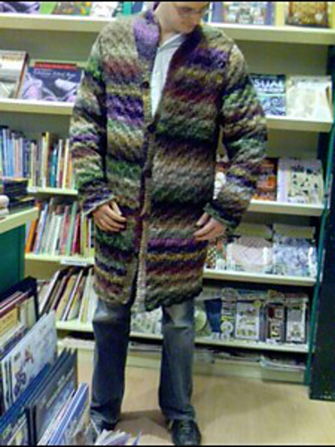 Jared found the discontinued yarn for this project in a gorgeous variegated brown. This photo is copyright "frederick" on ravelry, and slurped from hence. I would have just taken a picture of the project in the book, but, well, you'll see...